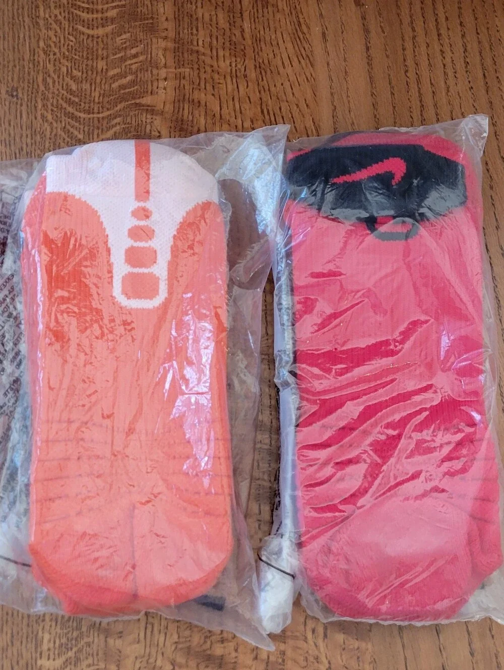 2 pair Nike peeformance basketball socks - orange & white, red & black